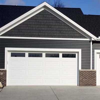 Porte sopraelevate sezionali isolate moderne automatizzate d'acciaio galvanizzate della porta del garage
