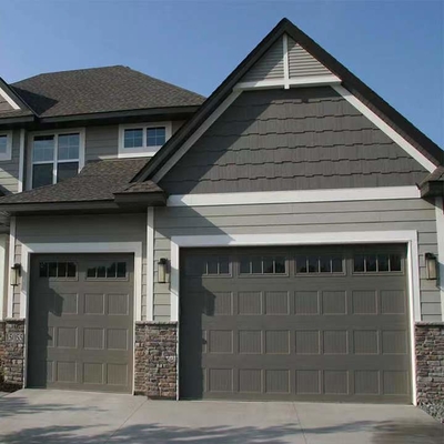 Porte sopraelevate sezionali isolate moderne automatizzate d'acciaio galvanizzate della porta del garage